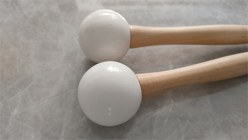 Singing bowl striker tool for quartz singing bowls